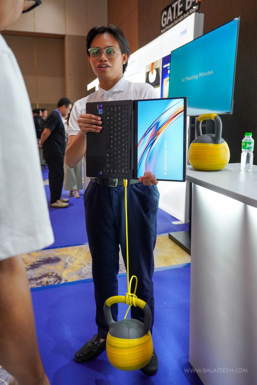 ASUS ExpertBook port durability test using a kettlebell at the Cebu launch